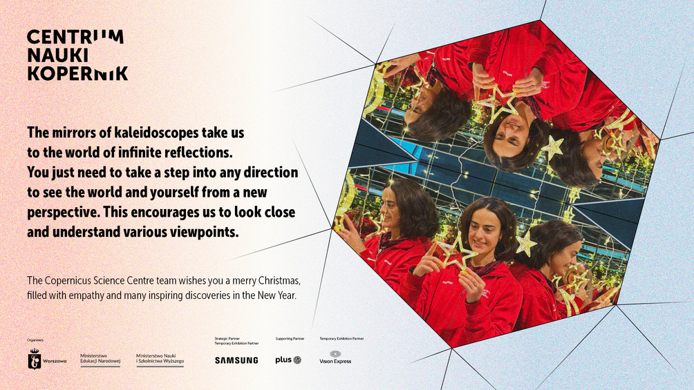 Christmas card of the Copernicus Science Centre. A woman in a red sweatshirt looks at a glowing star reflected multiple times in kaleidoscope mirrors. Christmas wishes appear beside the image.